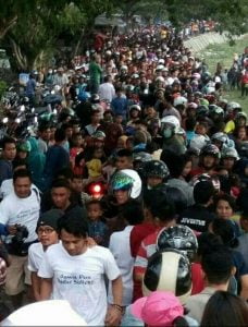 Panji si Petualang  Beraksi Mengevakuasi Buaya Berkalung Ban