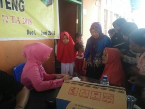 HUT Bhayangkara Ke 72 : Polres Buol Beri Pengobatan Gratis Ke Warga