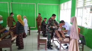 KODIM 1305/BT BUKA LAYANAN KESEHATAN GRATIS DI LOKASI TMMD 103